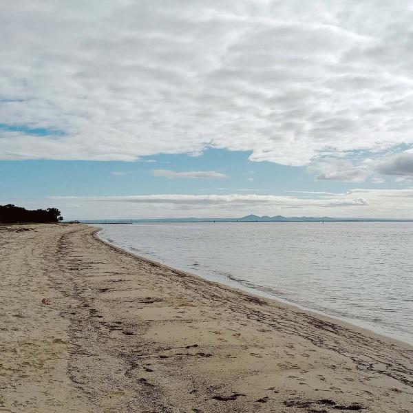 View over beach towards the You Yangs